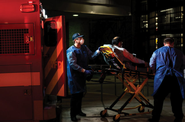 Medics bringing a patient to Houston Methodist Hospital in June 2020