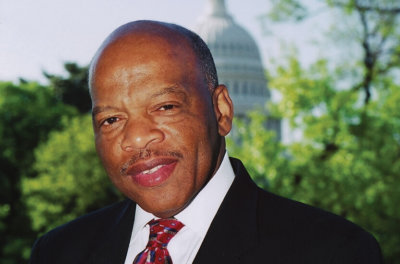 Portrait photo of John Lewis in front of the U.S. Capitol building