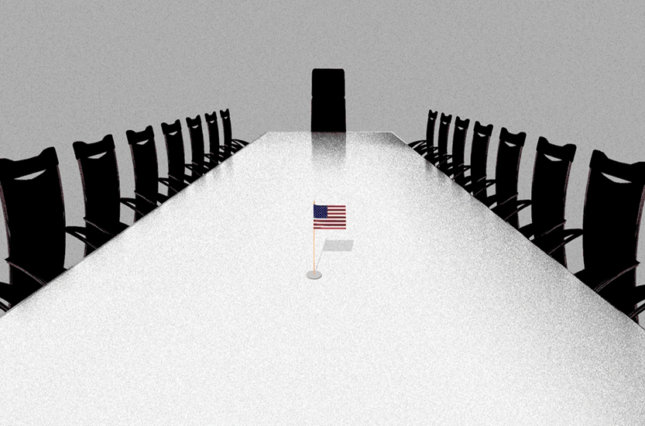 Tiny American flag in the middle of a large board room conference table