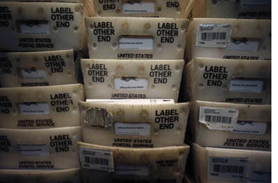 Processed mail-in ballots are seen at the Bucks County Board of Elections office prior to the primary election in Doylestown, Pa. on May 27, 2020.