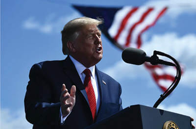 President Trump delivers remarks on the economy Monday at Mankato Regional Airport in Minnesota.