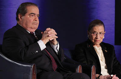 Supreme Court Justices Antonin Scalia and Ruth Bader Ginsburg, seen in 2014 at the National Press Club in Washington, were close friends.