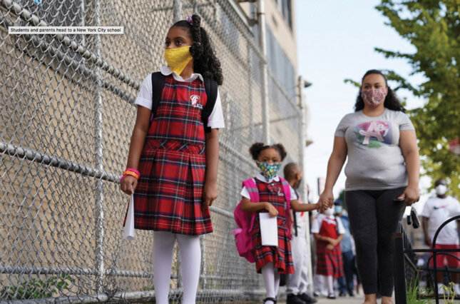 Students and parents walk to a New York City school