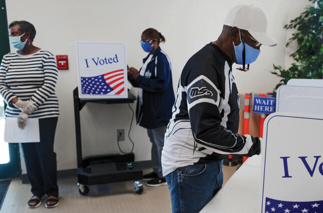 Black voters at a polling place