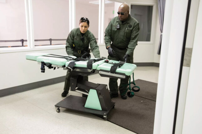 Staff members dismantle the death row lethal injection facility at San Quentin State Prison on March 13, 2019