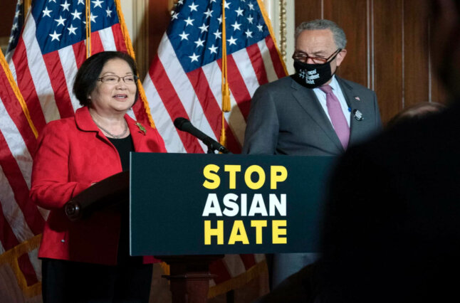 Sen. Mazie Hirono, D-Hawaii, accompanied by Senate Majority Leader Chuck Schumer, D-N.Y., addresses a news conference last week in Washington. Hirono introduced the legislation in the Senate.