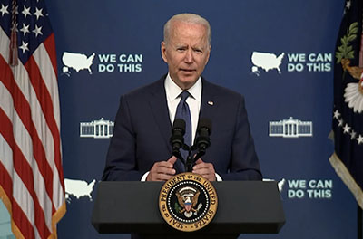 Photo of President Biden speaking to reporters