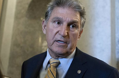 West Virginia Senator Joe Manchin speaking with the press