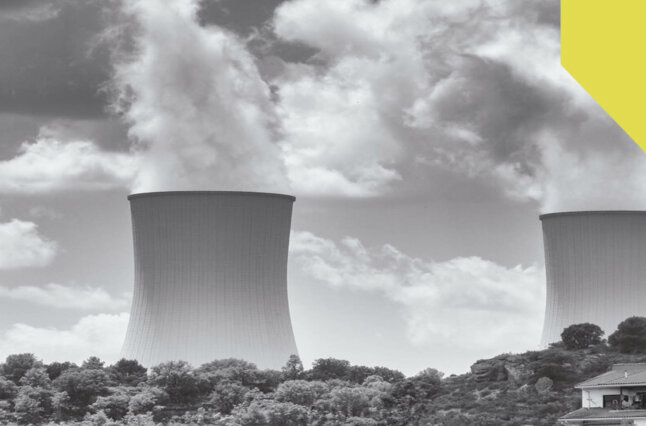 Black and white photo of cooling towers at a nuclear reactor