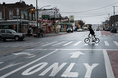 Photo of an intersection in the Brownsville neighborhood in New York City. An area with high drug activity.