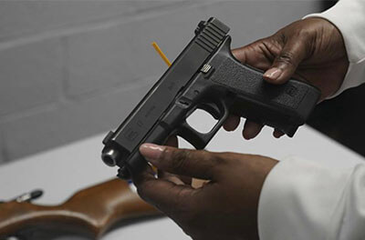 A handgun from a collection received in a gun buyback program in Brooklyn, NY. Photo credit: AP