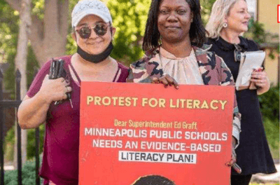 Parents protest outside a Minneapolis Public School board meeting