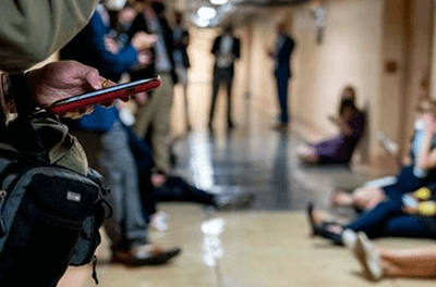 Graphic Image of school children waiting in the hall