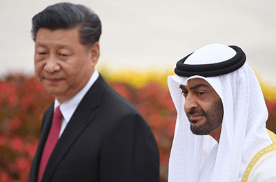 Emirati Crown Prince Mohammed bin Zayed walks with Chinese President Xi Jinping during a welcoming ceremony in Beijing