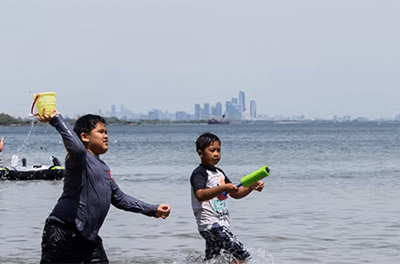 Kids playing in the waters of Lake Ontario