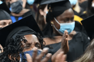 Students celebrating college graduation