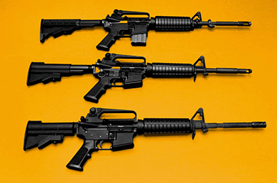 Photo of three assault rifles