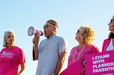 Rabbi Peter Levi, regional director for the Anti-Defamation League, speaks to a crowd of protesters in Laguna Beach, California, on June 24 after the Supreme Court overturned Roe v. Wade.