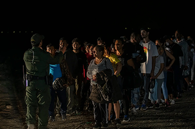 Migrants who arrived at the southern border in Texas waiting to be processed by Border Patrol. Asylum seekers who enter the United States from Mexico do not count toward the refugee limit.Credit...