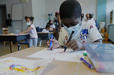 Students at their desks in an elementary school