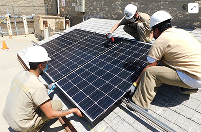 Students at a jail train to install solar panels.