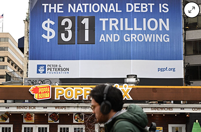 Billboard showing the current U.S. national debt.