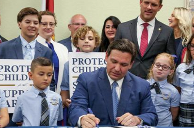 Florida Governor Ron DeSantis signing education legislation