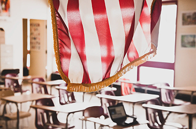 U.S. flag hanging in a classroom.