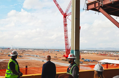 Workers at a construction site of a chip manufacturing plant