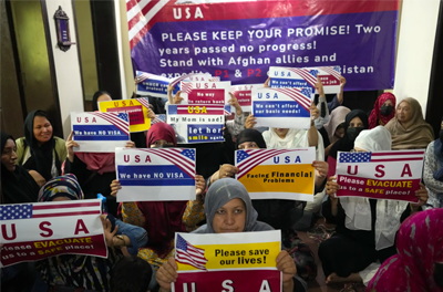 Afghan refugees hold a rally to demand their U.S. visas to be processed in Islamabad.