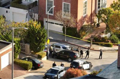 In an aerial view, San Francisco police officers and F.B.I. agents gather in front of the home of U.S. Speaker of the House Nancy Pelosi on Oct. 28, 2022 in San Francisco, after her husband Paul Pelosi was violently attacked in their home by an intruder.