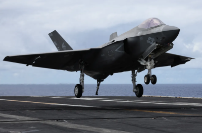 A F-35 jet lands on the USS Carl Vinson aircraft carrier during the Rim of the Pacific (RIMPAC) military exercises about 100 miles south of Oahu, Hawaii.